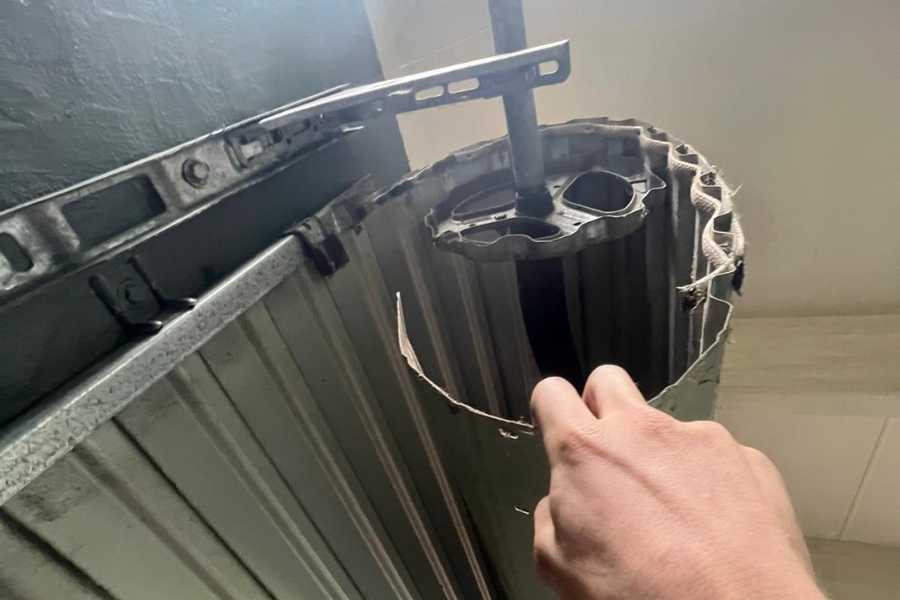 How to Fix a Bent Garage Door Track Without Hiring a Expert | GDR Sydney